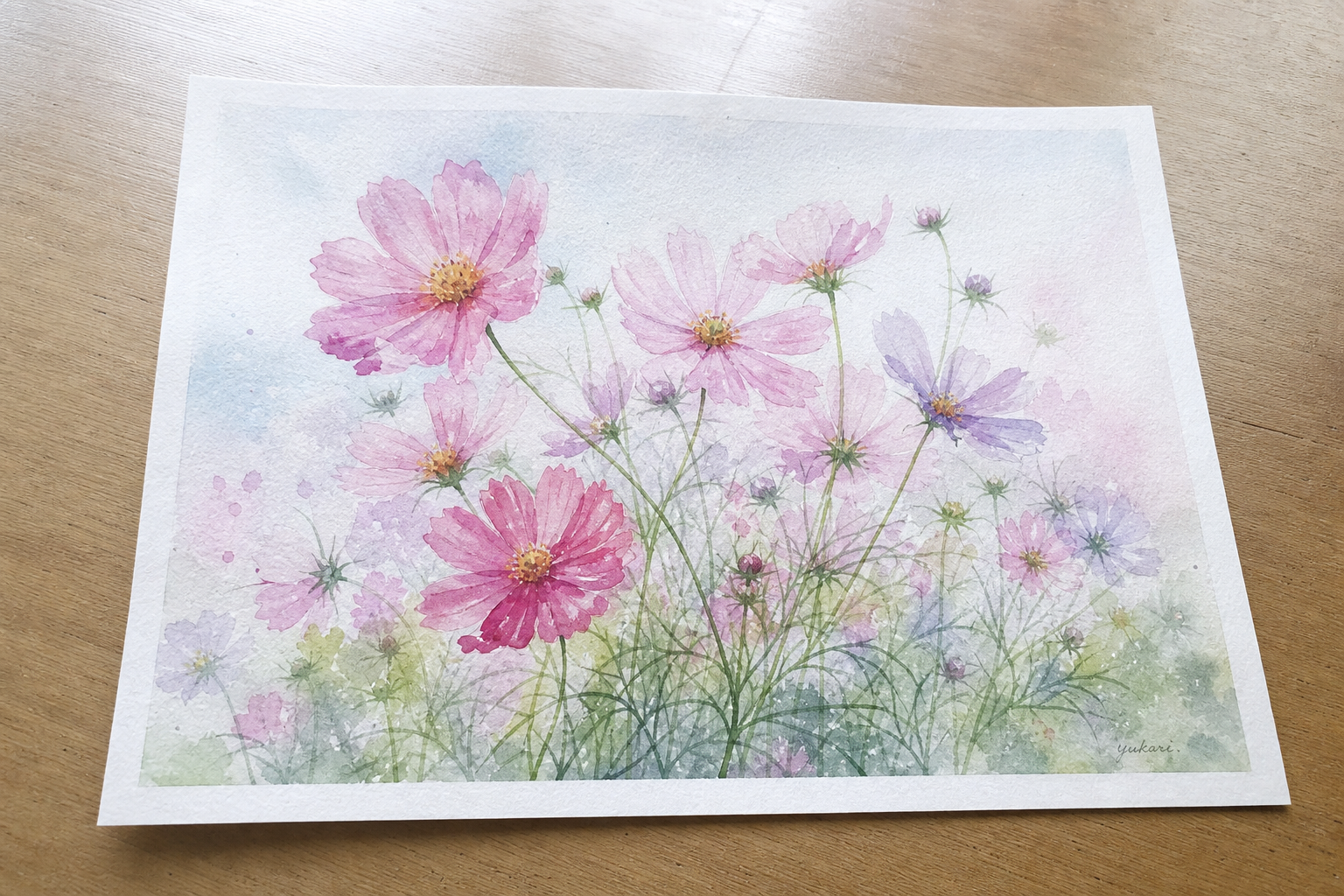 写真:ご自身が描いたコスモスの水彩画作品の全体写真を1枚入れてください。花びらの透け感が伝わるアングルで撮影すると効果的です